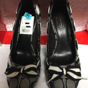 NIB Coach Signature Tena wedges.